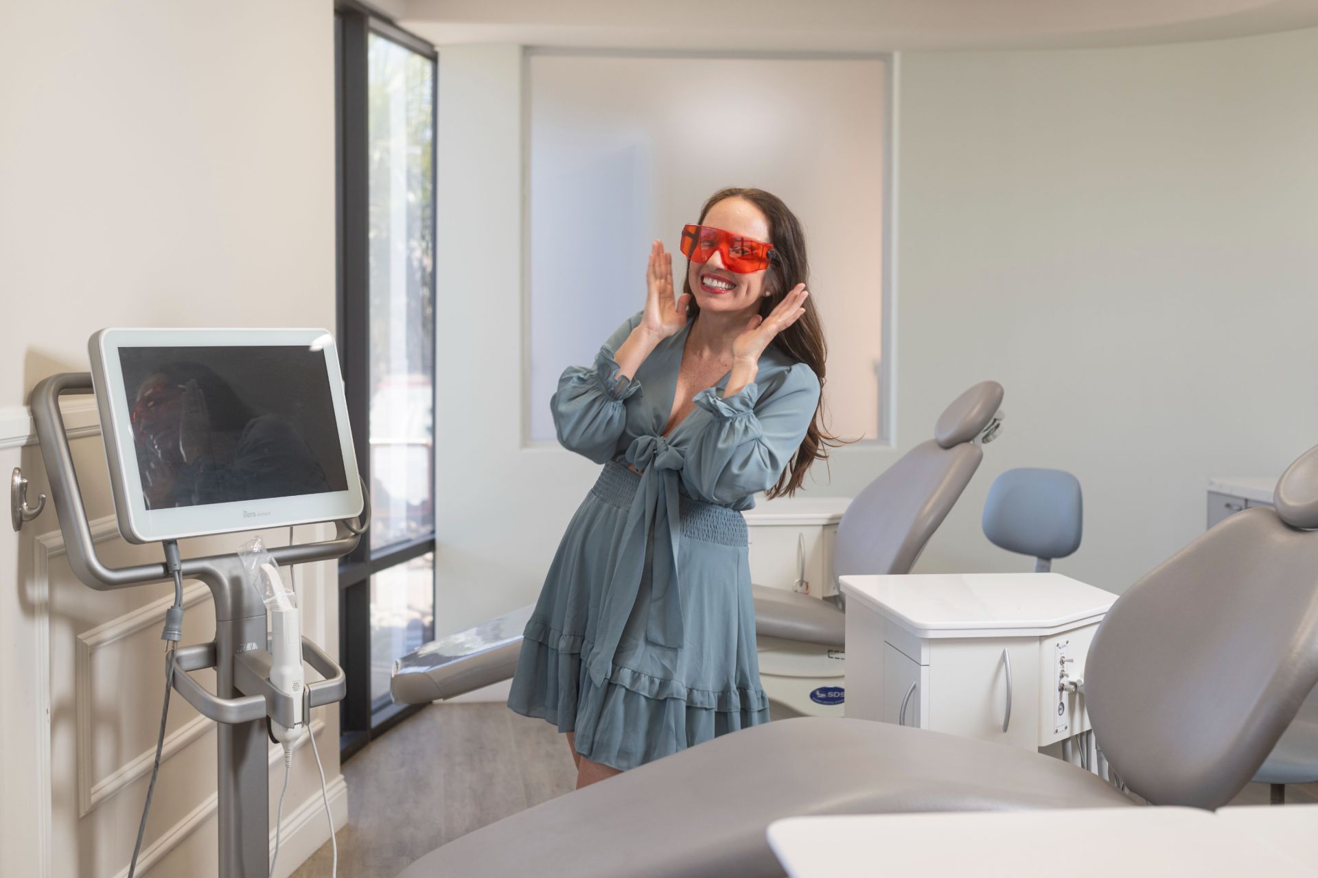 Dr. Velez smiling in office