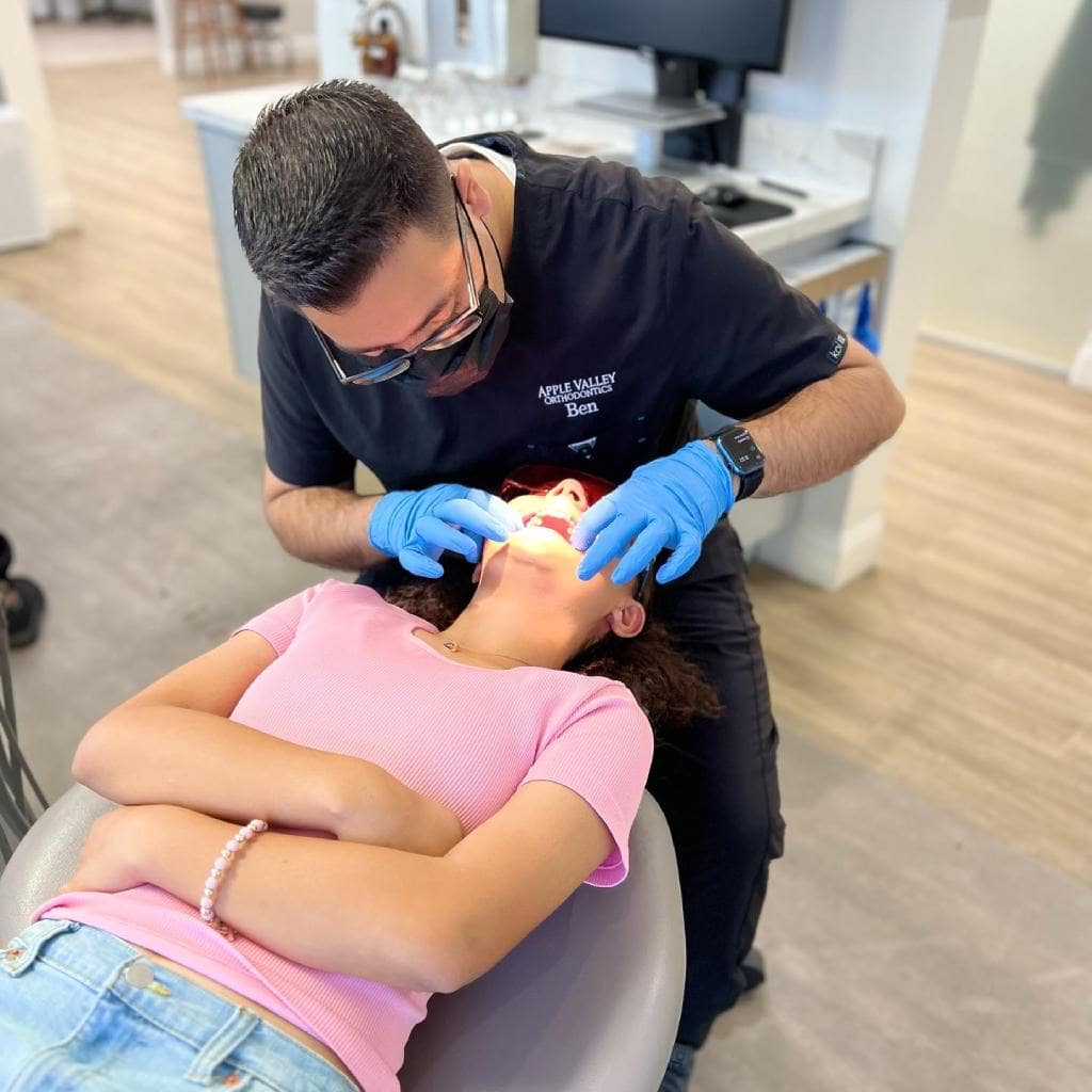 Ben working with young patient